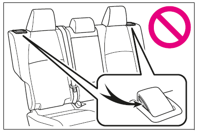 After returning the rear seatback to the upright position